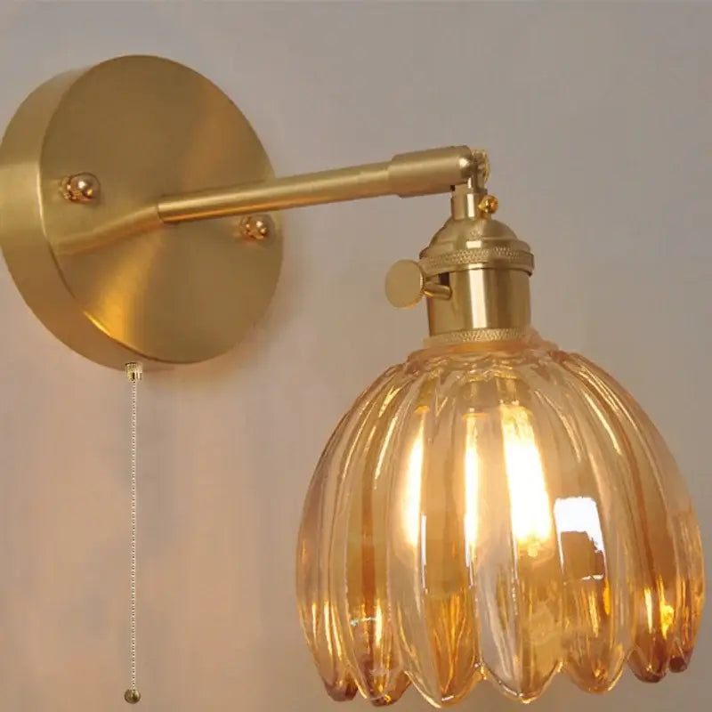 Vintage brass and ribbed amber glass wall light bedroom pull chain