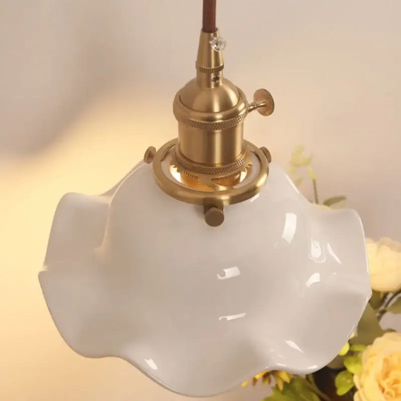 Vintage brass and scalloped glass wall sconce bedroom light