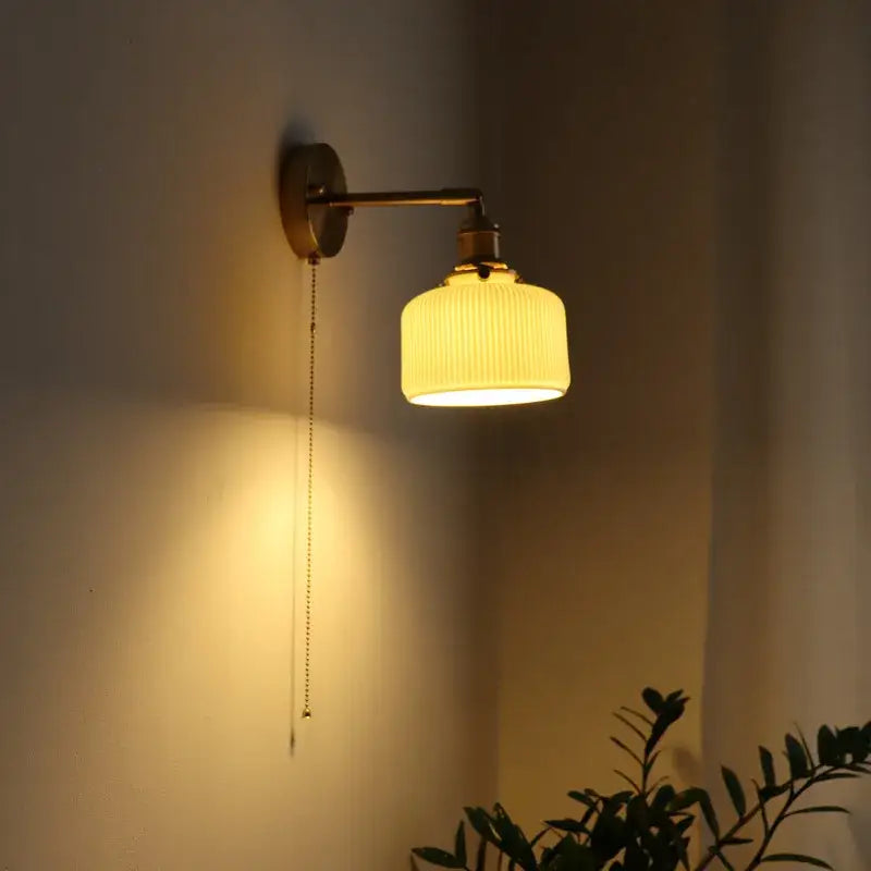 Vintage brass ceramic led wall sconce with ribbed glass for bedroom
