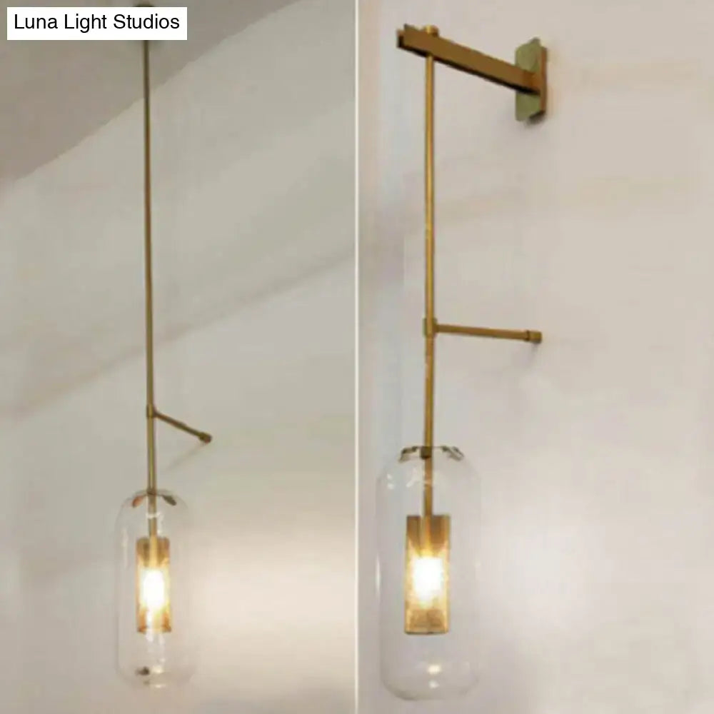 Vintage brass wall lamp with clear glass cylinder – living room sconce