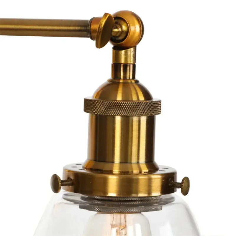Vintage brass wall light fixture with glass dome for bedroom