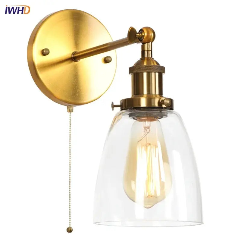 Vintage brass wall light fixture with glass dome for bedroom
