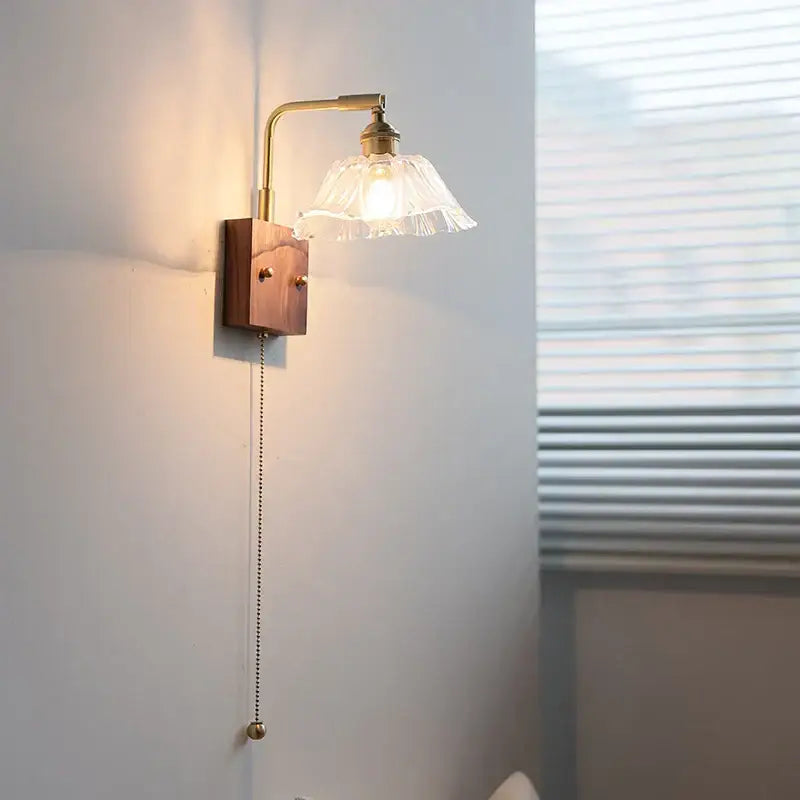 Vintage brass wall light with etched clear glass bedroom sconce