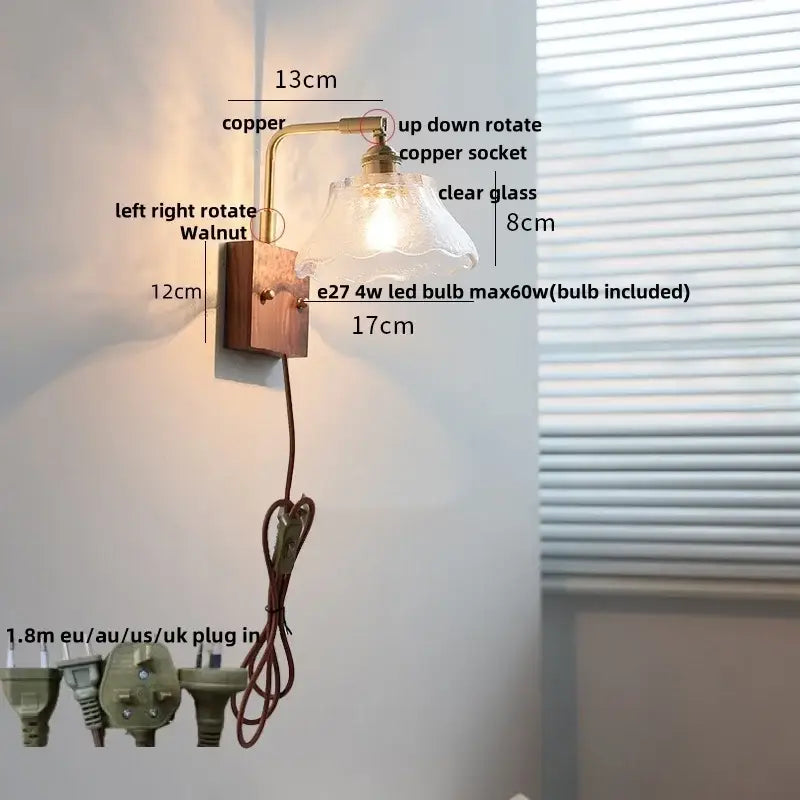 Vintage brass wall light with etched clear glass bedroom sconce