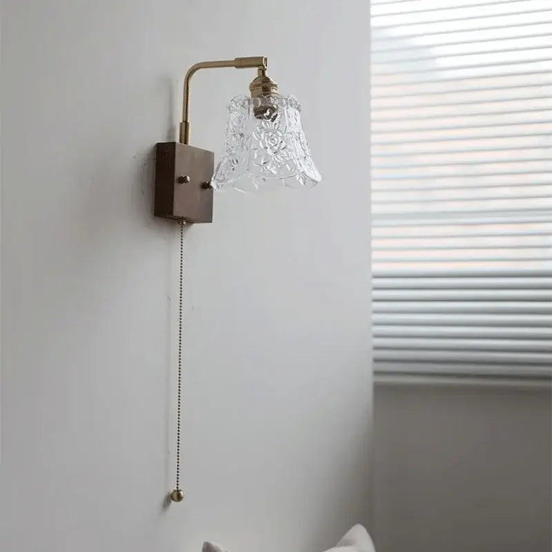 Vintage brass wall light with etched clear glass bedroom sconce