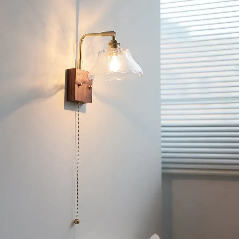 Vintage brass wall light with etched clear glass bedroom sconce
