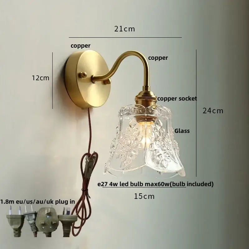 Vintage brass wall sconce with scalloped clear glass for stairways
