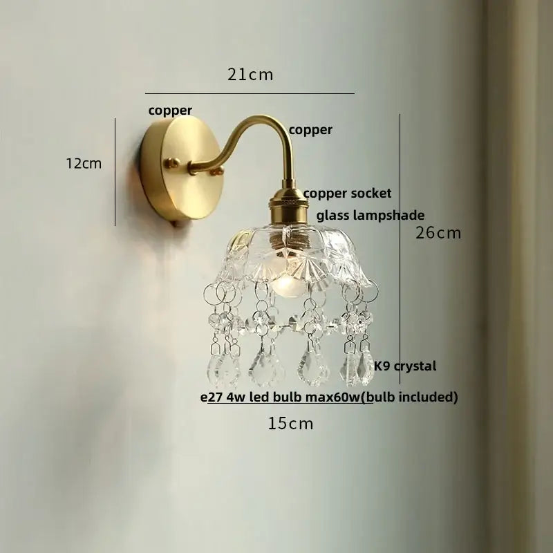 Vintage brass wall sconce with scalloped clear glass for stairways