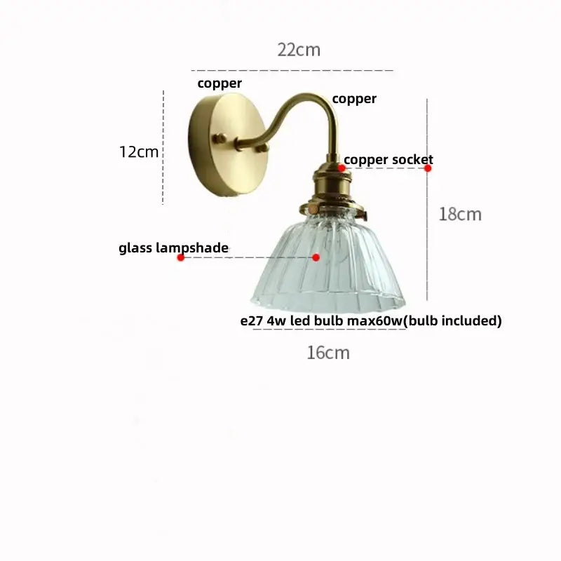 Vintage brass wall sconce with scalloped clear glass for stairways