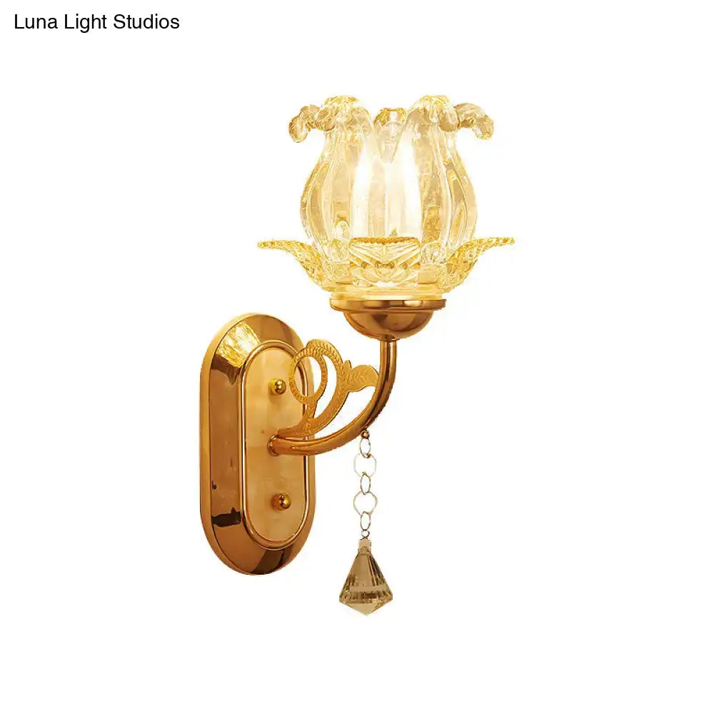 Vintage gold flower wall sconce with amber glass shade bedroom light