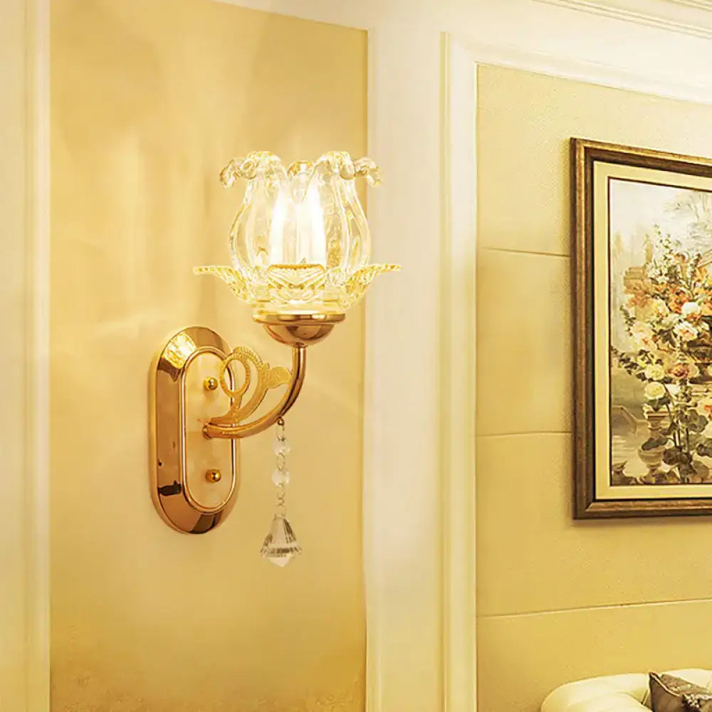 Vintage gold flower wall sconce with amber glass shade bedroom light