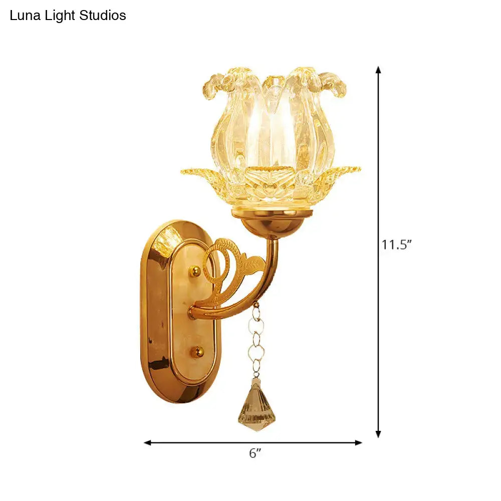 Vintage gold flower wall sconce with amber glass shade bedroom light