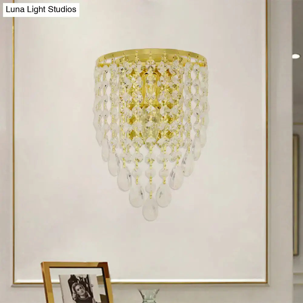 Vintage gold tapered wall mount with clear crystal draping bedroom light
