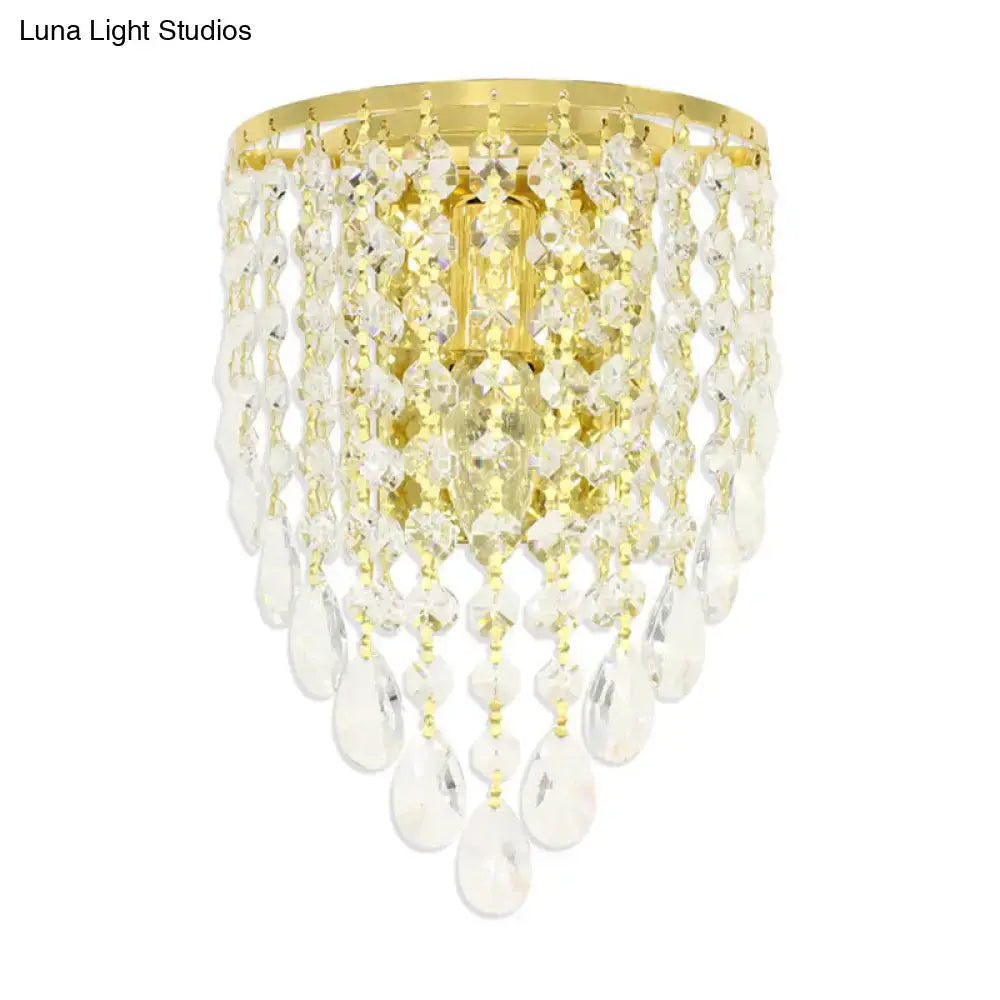 Vintage gold tapered wall mount with clear crystal draping bedroom light