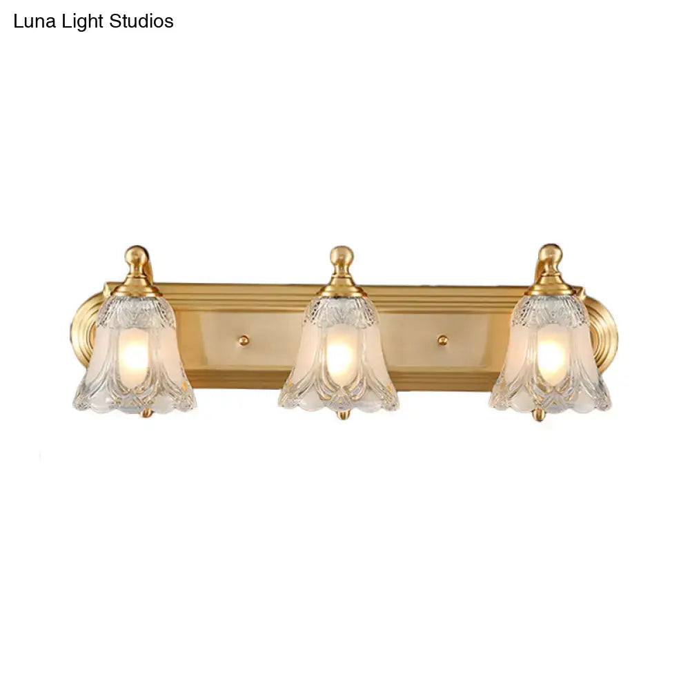 Vintage gold wall light with clear glass shade bathroom vanity lighting