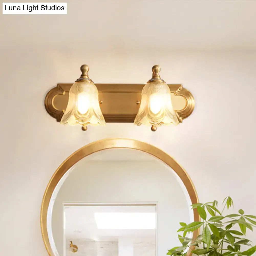 Vintage gold wall light with clear glass shade bathroom vanity lighting