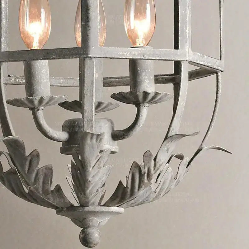 Vintage grey metal cage lantern chandelier – dining room leaf motif
