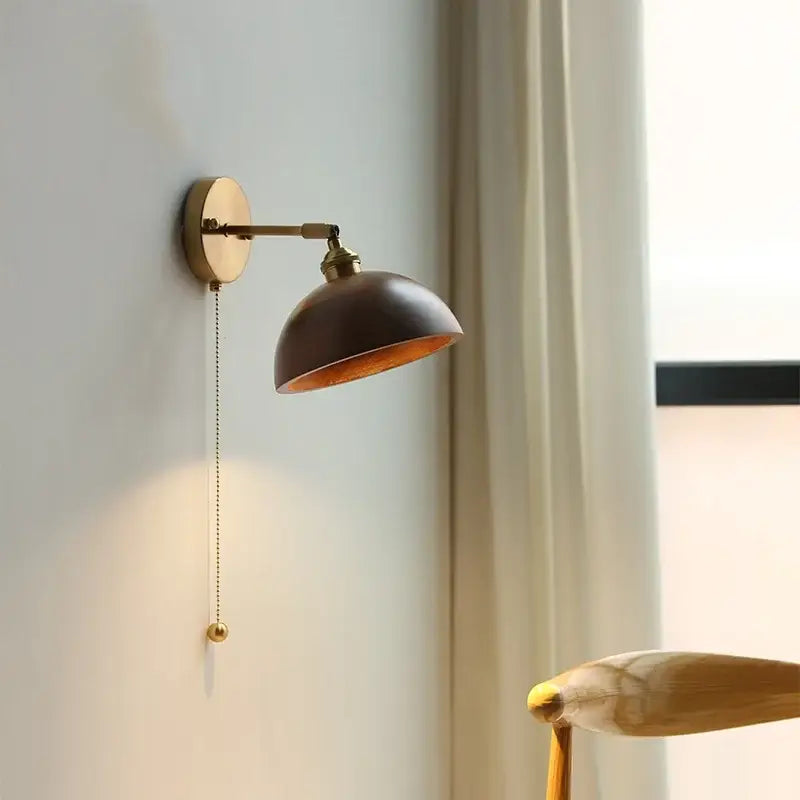 Walnut and brass wall sconce with pull chain switch bedroom light