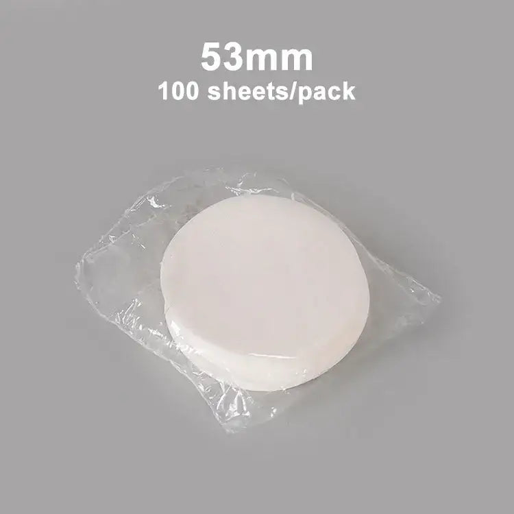 White circular disposable coffee filter papers kitchen espresso tool