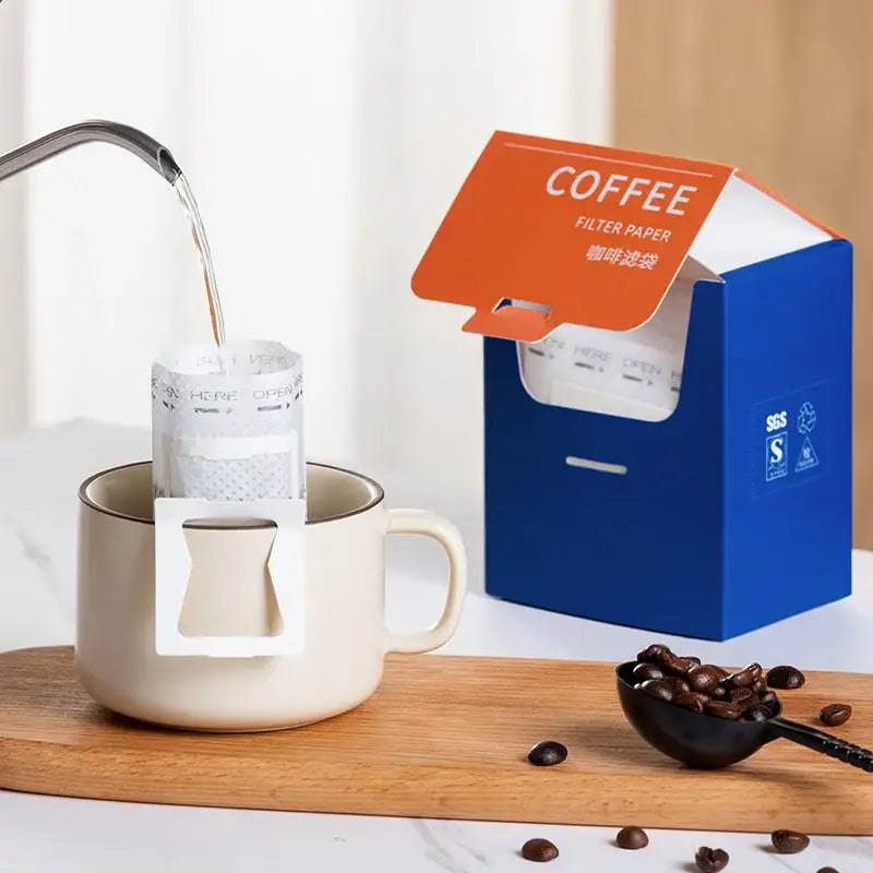 White disposable coffee filter bags kitchen pour over setup