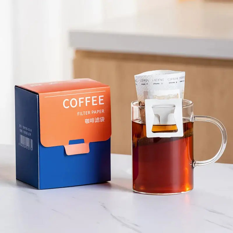White disposable coffee filter bags kitchen pour over setup