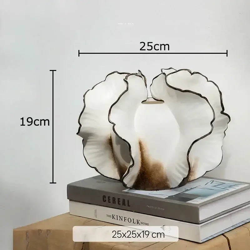 White & gray ruffled ceramic vase with artificial flowers living room