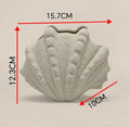 White ridged ceramic clam shell vase living room decor